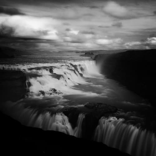 Gullfoss waterfall and its canyon in black and white