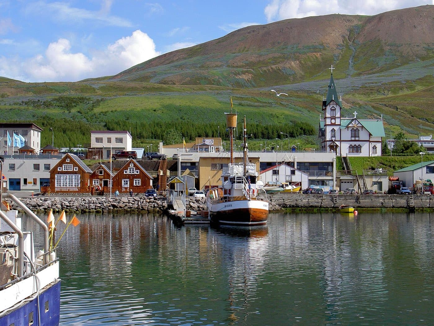 The harbour and wooden church at Husavik in north Iceland