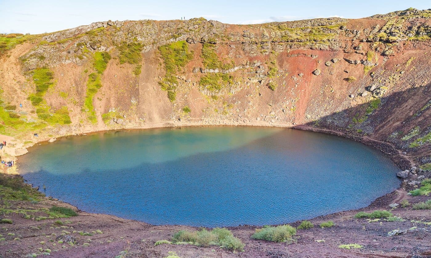The red rim and green lake of Kerid volcanic crater