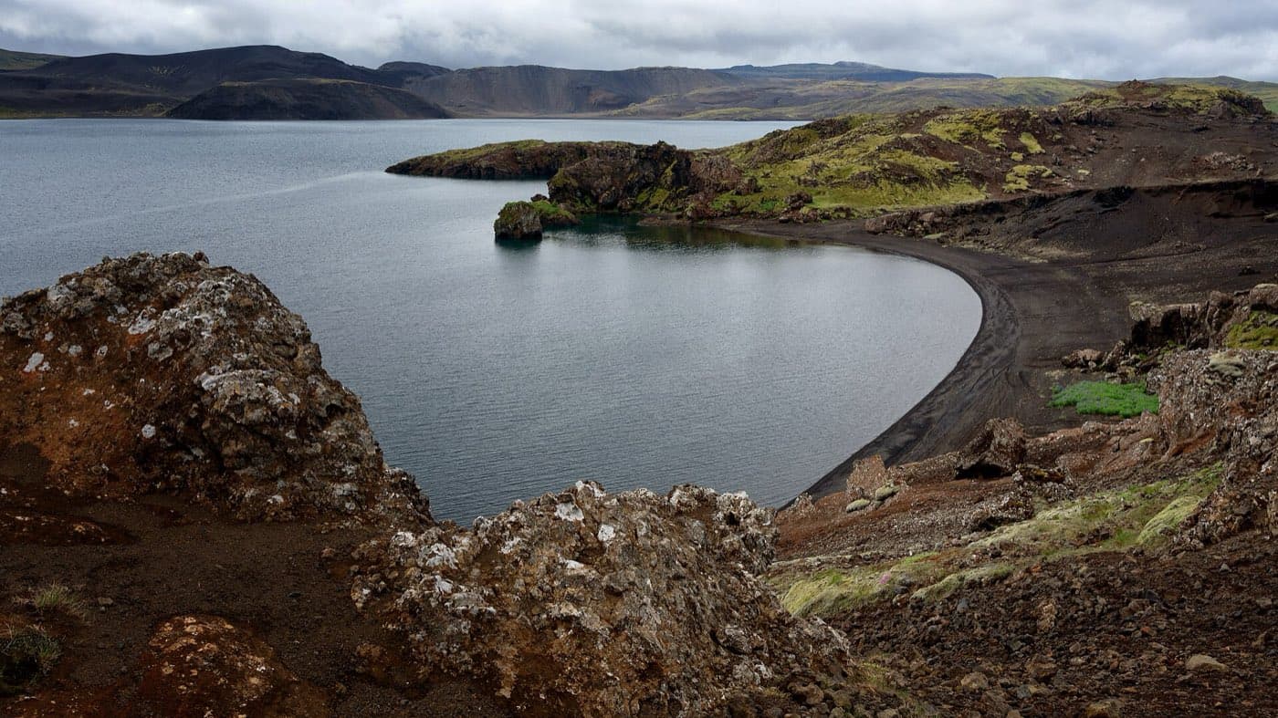 Lake Kleifarvatn between dark hills on the Reykjanes peninsula