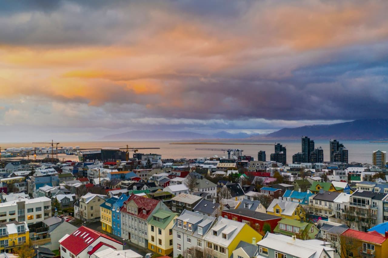 Colourful rooftops of central Reykjavik with the bay behind