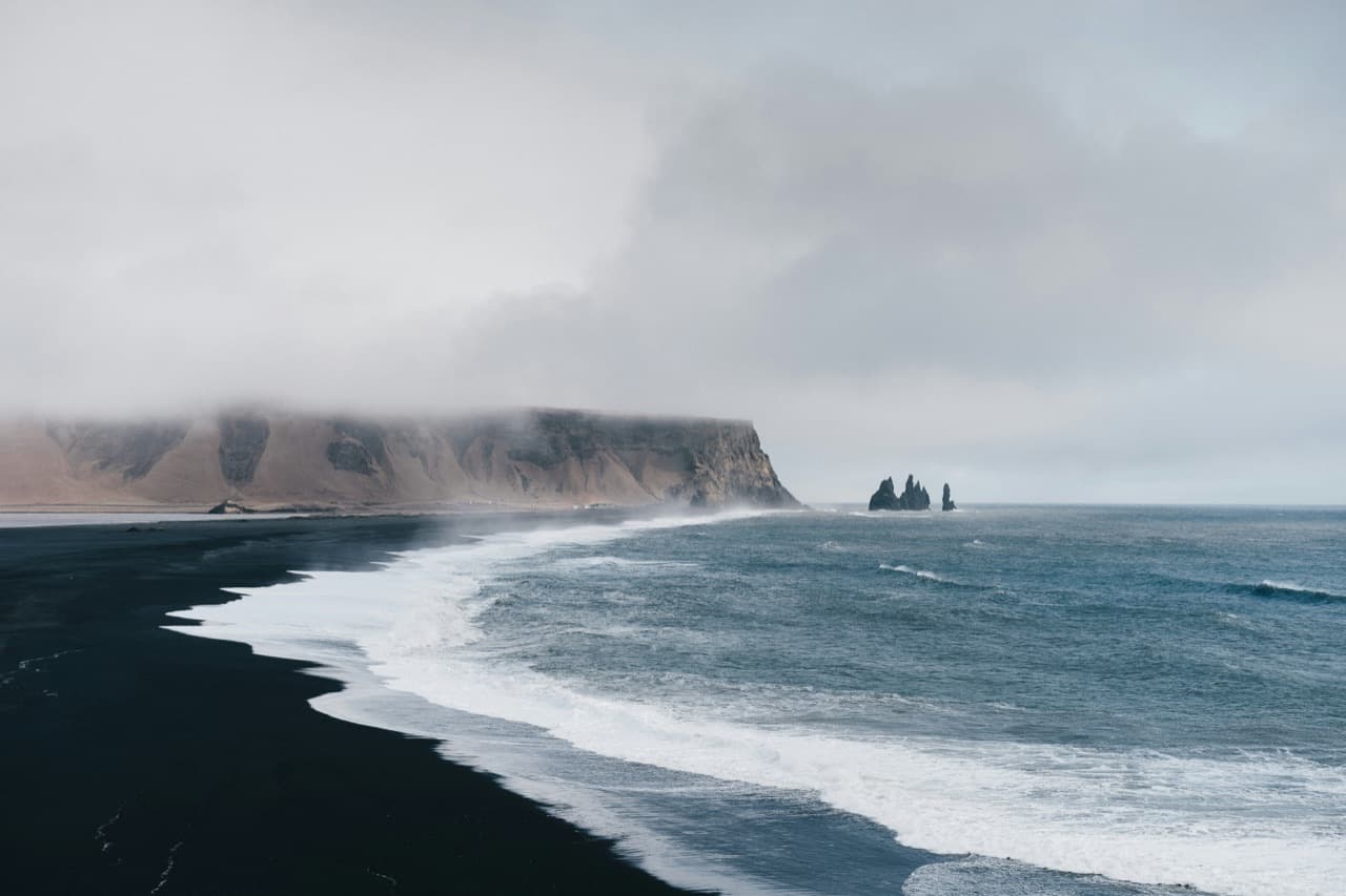 Basalt columns and the Reynisdrangar sea stacks at Reynisfjara black sand beach