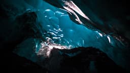 The blue interior of an ice cave under Vatnajokull glacier